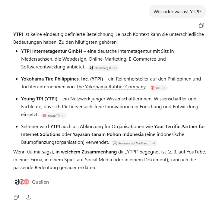 Screenshot einer KI-Antwort auf „Wer oder was ist YTPI?“: Die KI listet mehrere mögliche Bedeutungen auf, darunter YTPI Internetagentur GmbH, Yokohama Tire Philippines und Young TPI, und bittet um mehr Kontext zur genauen Einordnung.